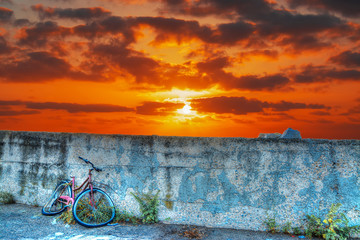 bike wreck at sunset