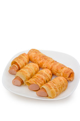 croissant hotdog roll on dish,isolated