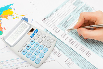 Male ready to fill out US 1040 Tax Form
