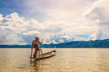 Foto op Canvas Myanmar fisherman at Inle lake catching fish by traditional tool © Photo Gallery