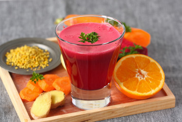 Beetroot, orange, ginger juice with pollen