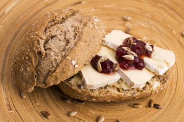 bread served with camembert and cranberry
