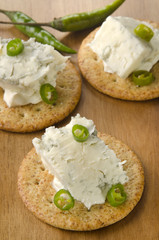 cracker with gorgonzola and green chili