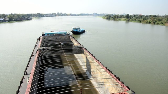 Barge and Tug Boat cargo ship in Choaphraya river at Ayutthaya