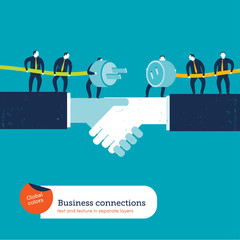 Businessmen with plug and socket on a handshake