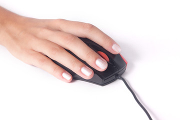 Female hand with computer mouse isolated on white background