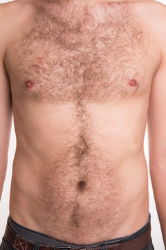 Unshaven man's chest and abdomen