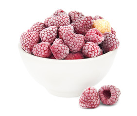 Frozen raspberries in a saucer isolated on white background