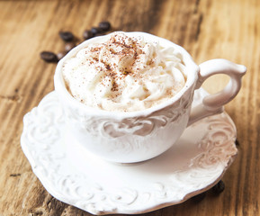 Vintage Coffee Cup with Cappuccino and Whipped Cream