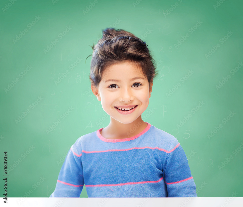 Poster little girl over chalk board background at school