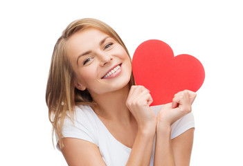 smiling woman in white t-shirt with heart