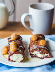 eat chocolate pancakes with cottage cheese and condensed milk,br