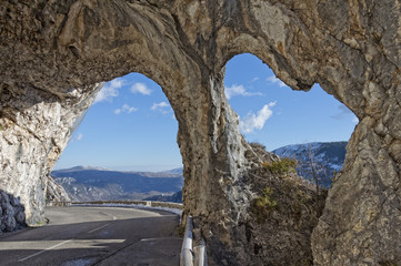 natural rock arches in provence mountain road