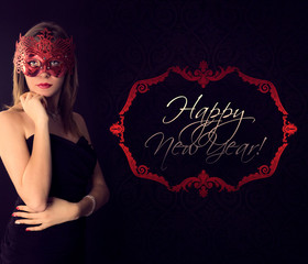 Beautiful girl in a carnival mask and Happy New Year wishes - obrazy, fototapety, plakaty
