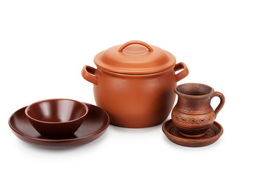 clay pot and different ceramic tableware