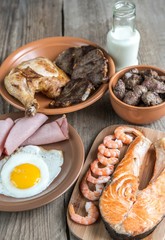 Protein diet:cooked products on the wooden background