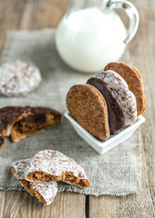 Glazed gingerbread cakes with pitcher of milk