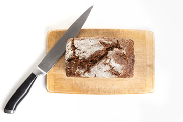 Brown bread on white background