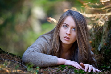 young woman portrait outdoor in autumn