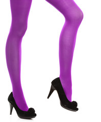 Woman long legs and violet stockings isolated