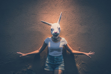 young hipster woman with rabbit mask - obrazy, fototapety, plakaty