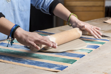 laminating the mud with roller