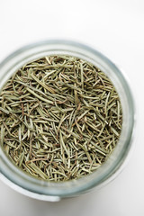 Dried rosemary on bottle,top view,close up