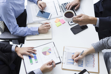 Four people have a meeting