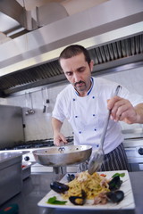 Fototapeta na wymiar chef preparing food