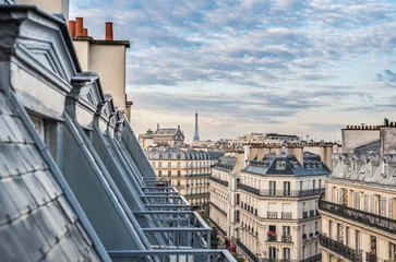 Vlies Fototapete Paris Dächer von Paris mit Eiffelturm im Hintergrund