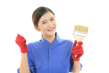 ガッツポーズの女性労働者