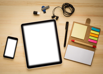 Digital tablet computer with isolated screen on old wooden desk.