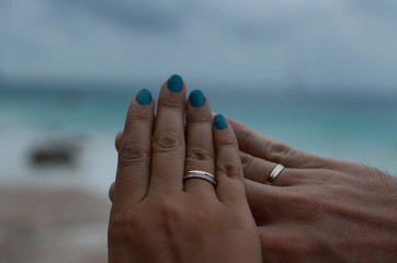 Hands with wedding rings