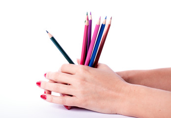 Woman hand holding pencils