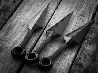 black and white throw ninja weapons © Nattapol_Sritongcom