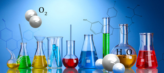 Different laboratory glassware with color liquid