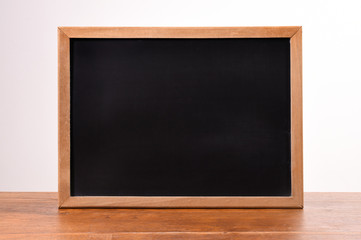 Empty blackboard with a wooden frame