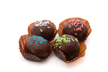 Chocolate balls isolated on white background