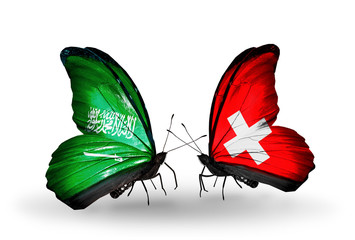 Two butterflies with flags Saudi Arabia and Switzerland