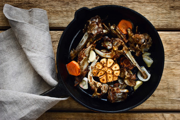 Ingredients for the broth from bones in the iron pot