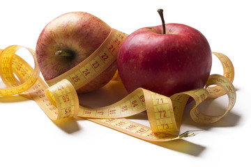 Fruits with measuring tape isolated