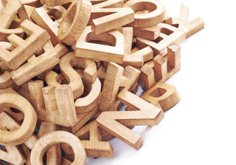 Pile of wooden block letters isolated