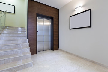Lobby interior with elevator door