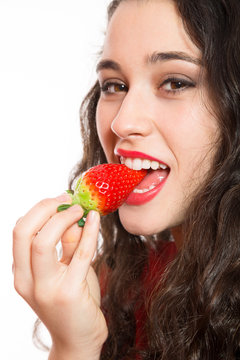 Sexy Woman Biting A Strawberry