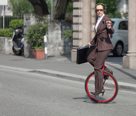 portrait of businesswoman with unicycle © alexandre zveiger