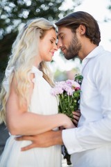 Attractive couple about to kiss each other