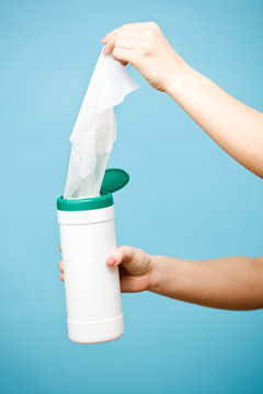 Cleaning: Pulling a Wet Wipe out of Container