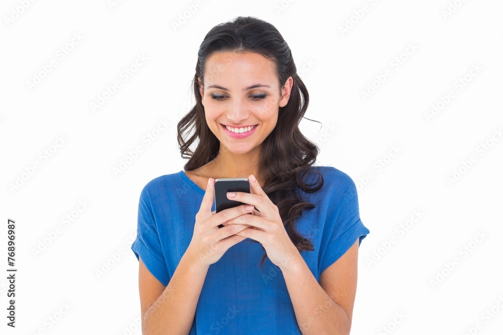 Poster pretty brunette sending a text