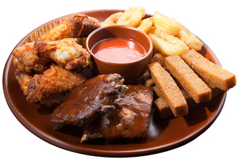 Different foods and snacks with sauce for beer