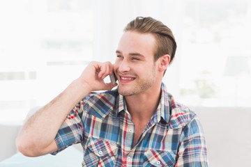 Portrait of smiling man on the phone